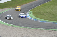 201 Die Corvette GT 3 wird in der Kurve vom Porsche 997 GT3 vernascht